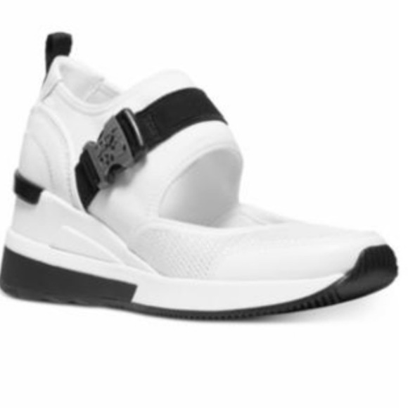 Michael Kors Shoes - NWT Michael Kors Effie wedge sneakers size 6,5